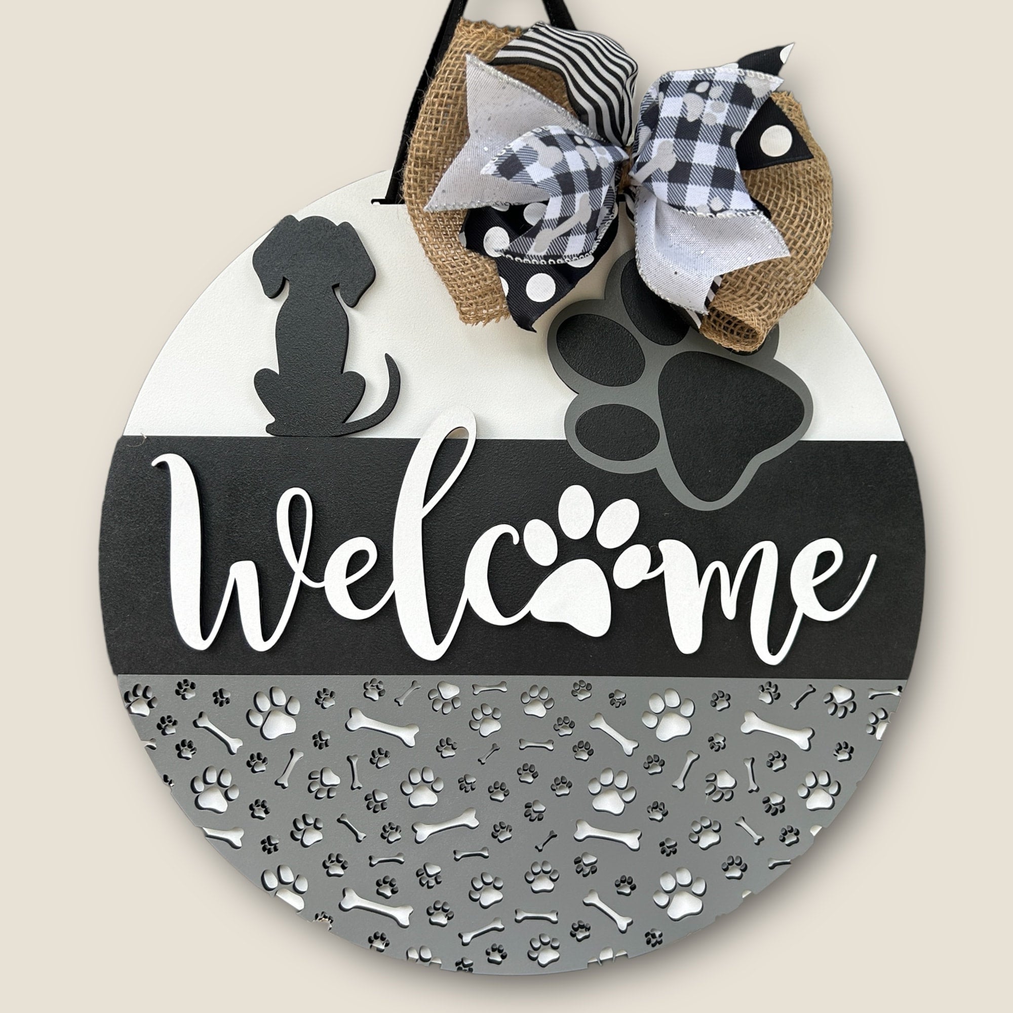 Welcome door sign with a dog and dog paws.