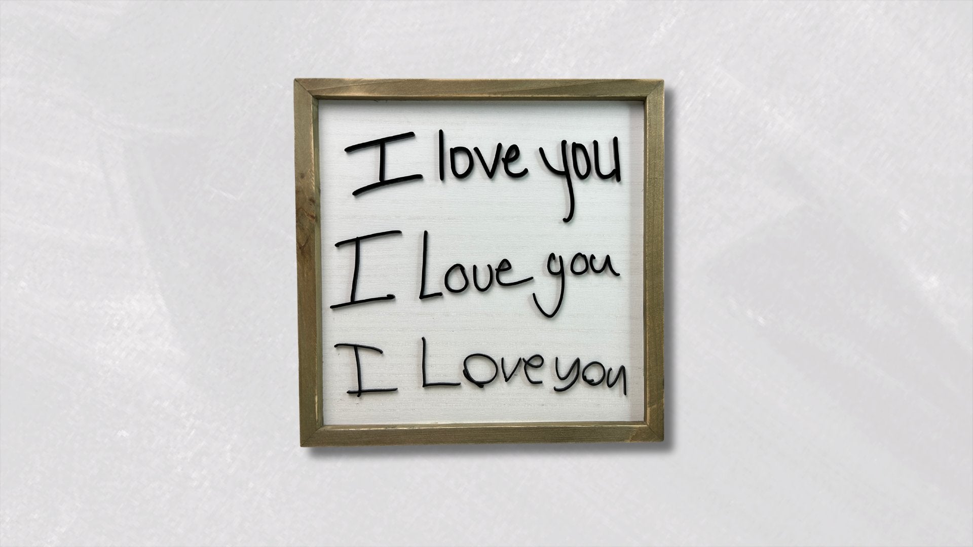Handwritten I love you sign.