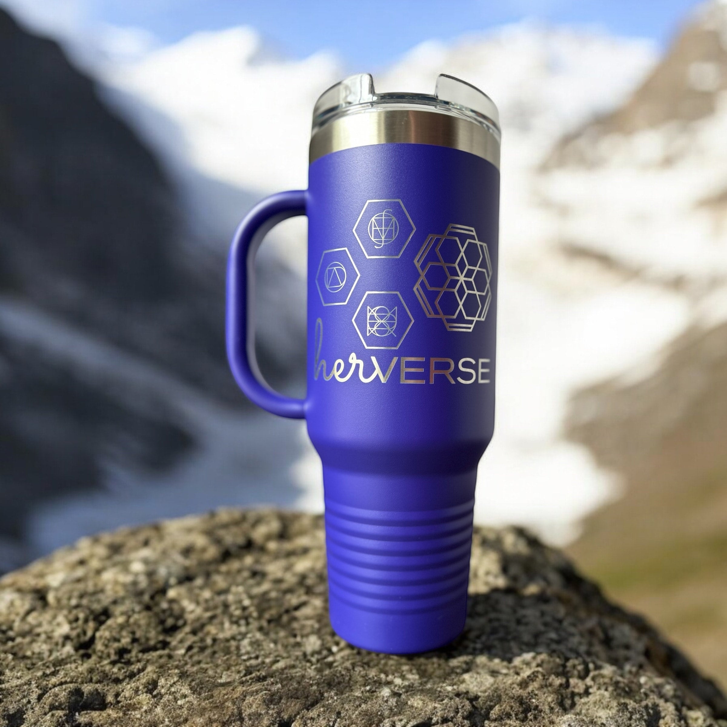 Purple 40oz tumbler with a business logo.