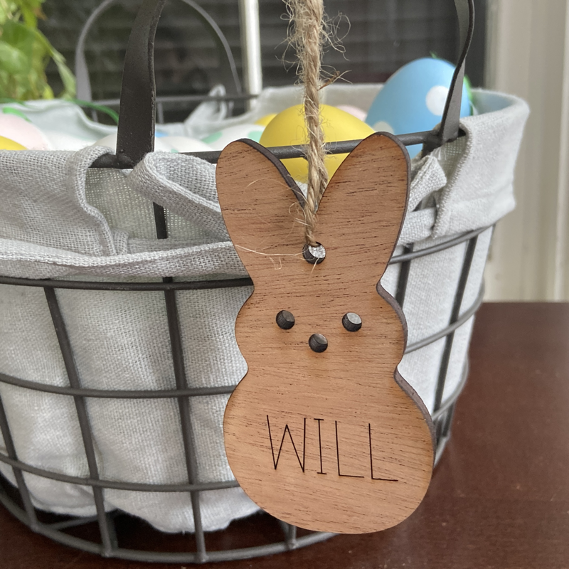 Bunny tag hanging on an Easter basket.