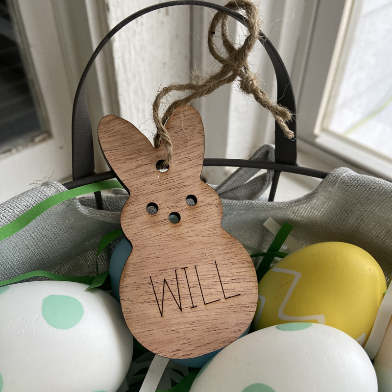 Close up bunny tag in an Easter basket.