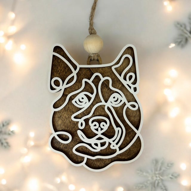 Adorable line art drawn dog ornament with a name.
