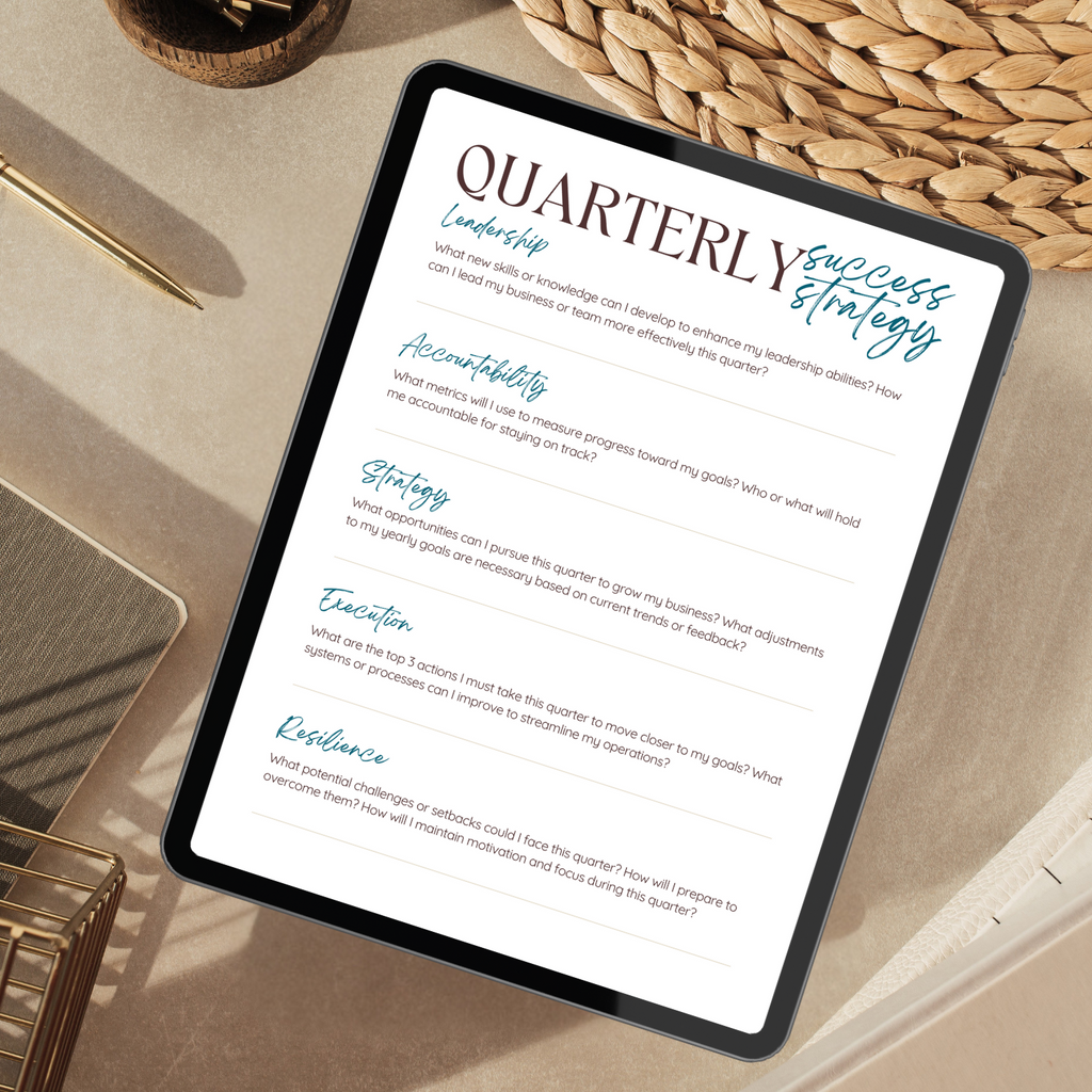 Tablet displaying a 'Quarterly Success Strategy' document on a desk.