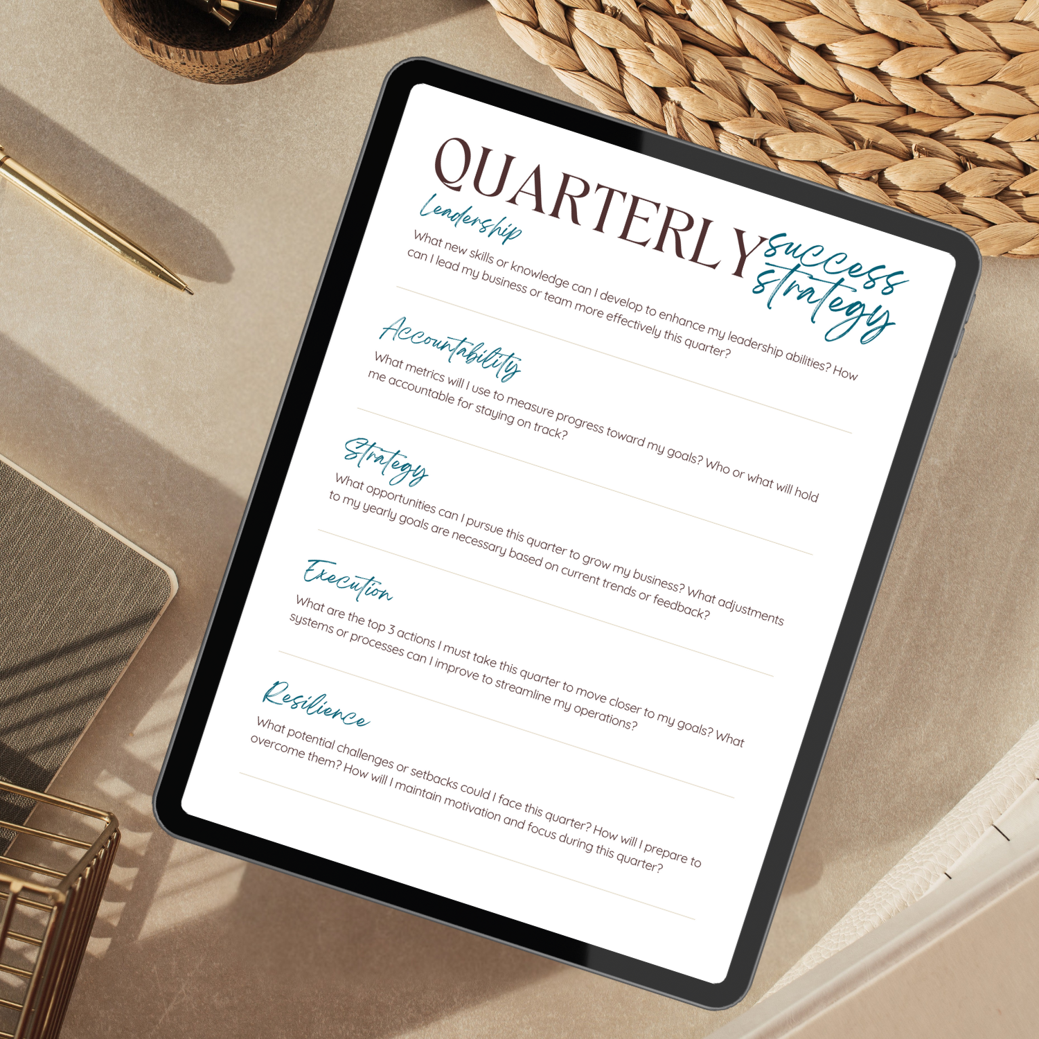 Tablet displaying a 'Quarterly Success Strategy' document on a desk.