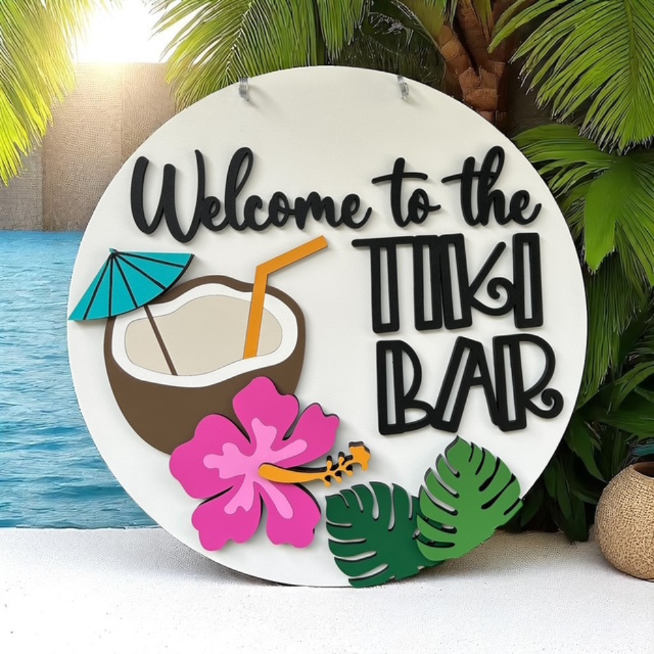 Decorative sign with 'Welcome to the Tiki Bar' text, coconut, umbrella, and flower design.