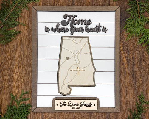 Alabama State Frame with a shiplap background and titled "Home is where your heart is".