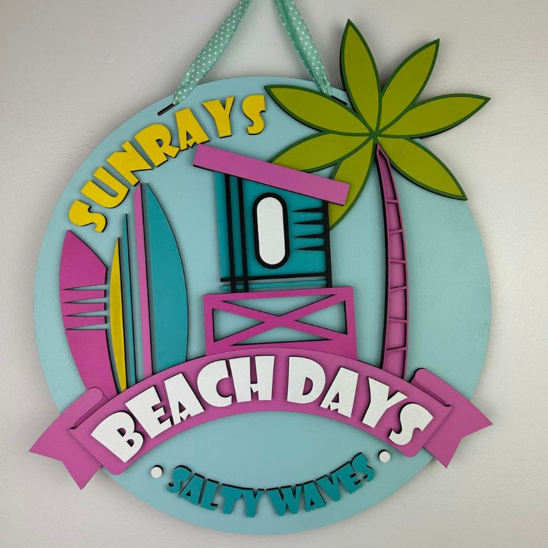 Summer Beach Days door sign with a palm tree and surf boards.