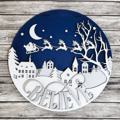 Believe Christmas town finished door sign.
