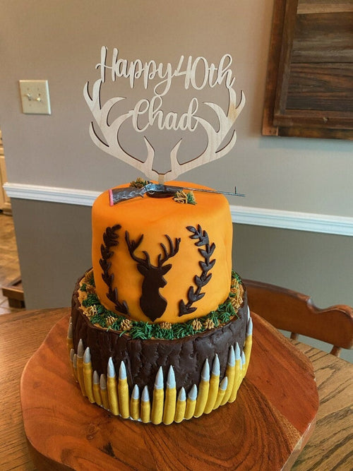 Deer Antler Cake Topper in a beautifully decorated cake.