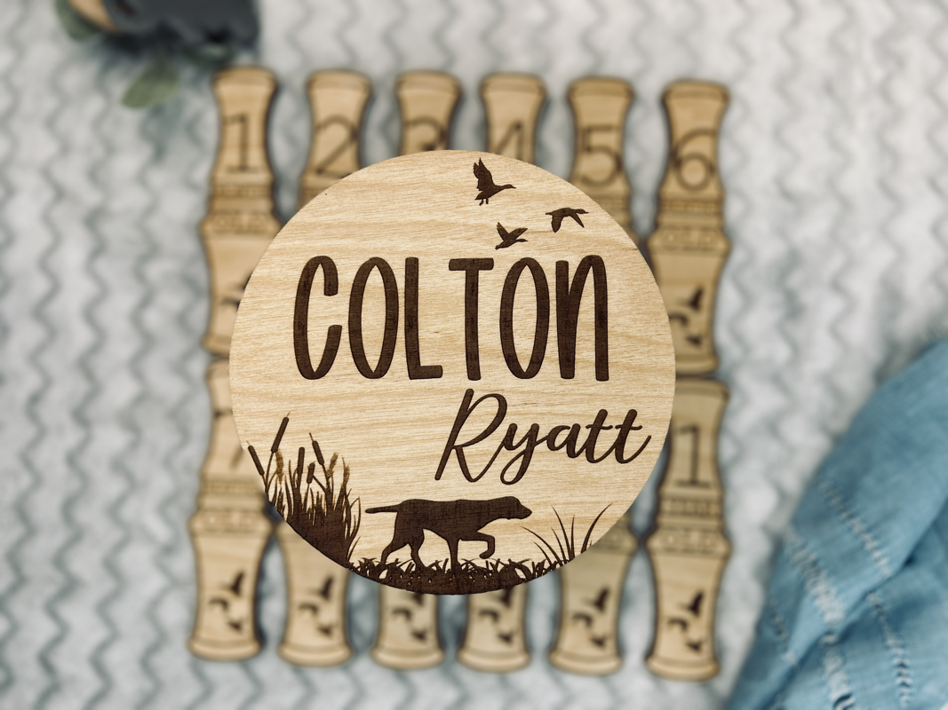 New baby duck hunting announcement and monthly milestones.
