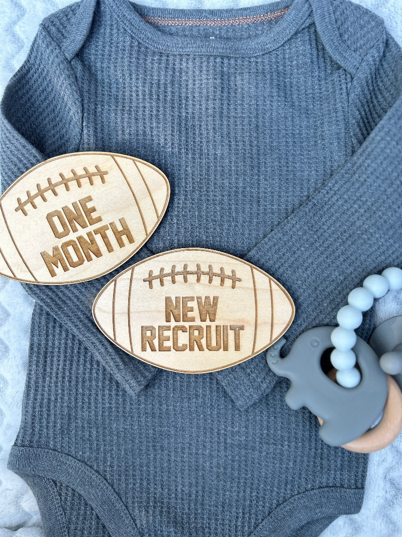 New baby football monthly milestones.