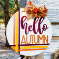Hellow Autumn door sign with a white background and fall colored accents.