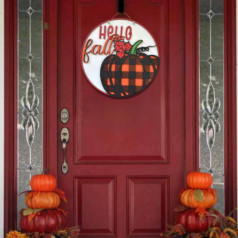 Decorative door sign with 'Hello Fall' and pumpkins on a red door, with pumpkins on either side.