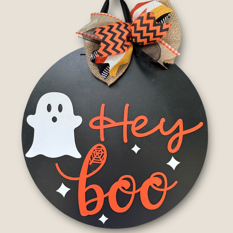 Hey Boo with a cute ghost finished door sign.