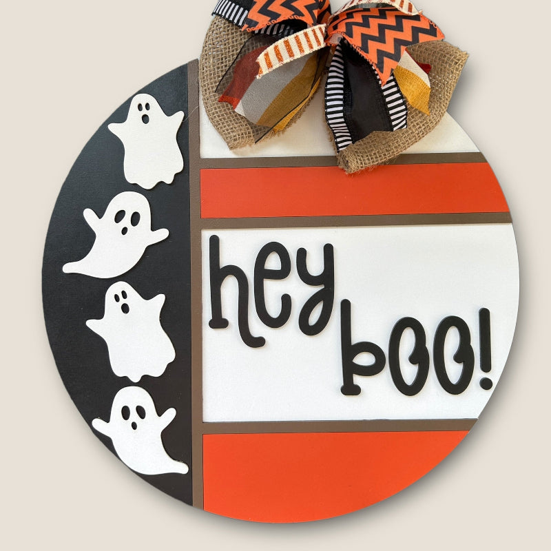 Hey Boo with a cute ghost finished door sign.