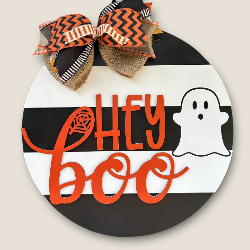 Hey Boo with a cute ghost finished door sign.