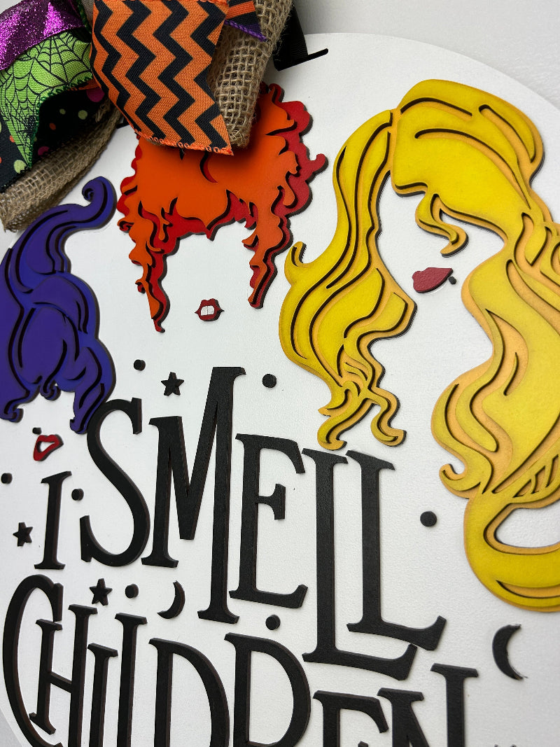 Close up of the I Smell Children finished door sign.