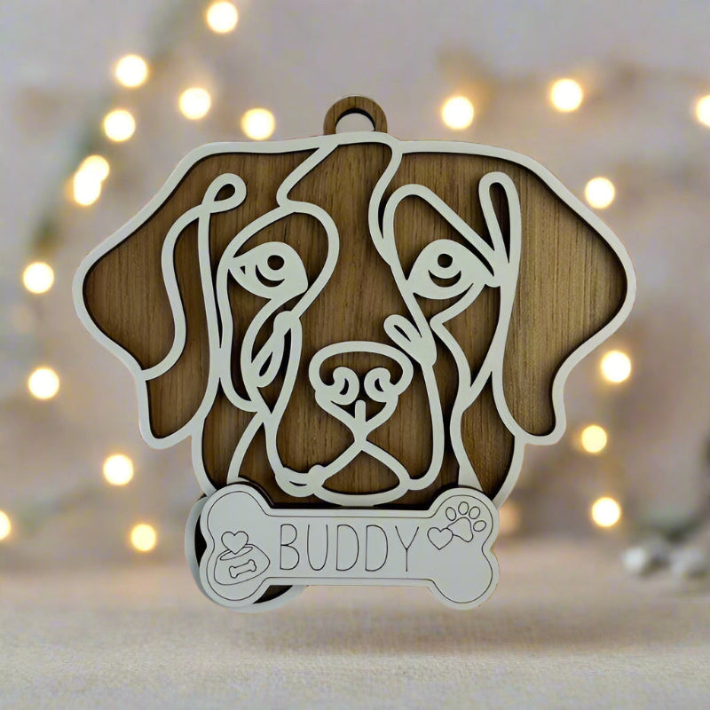 Adorable line art drawn dog ornament with a name.