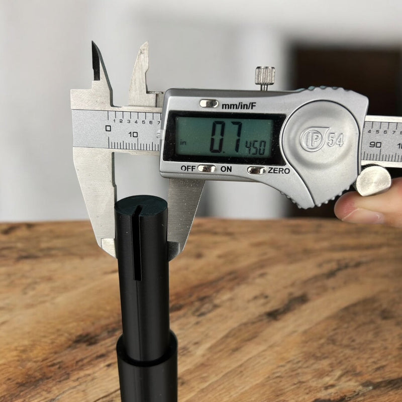 Calipers showing the size of the large wire curler being .745".