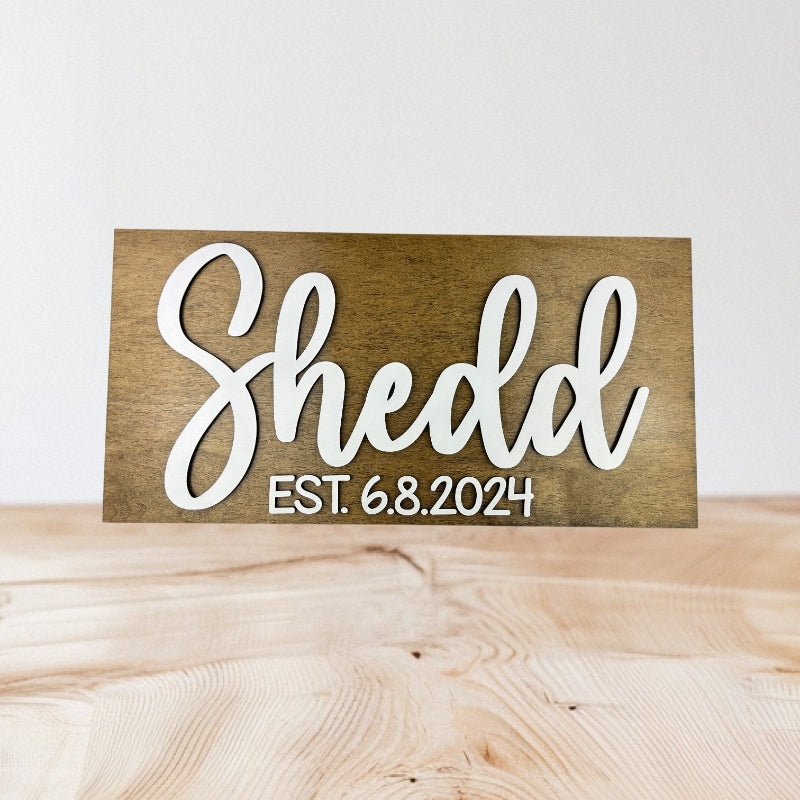 Wedding sign show casing the newlyweds last name and when they were married.