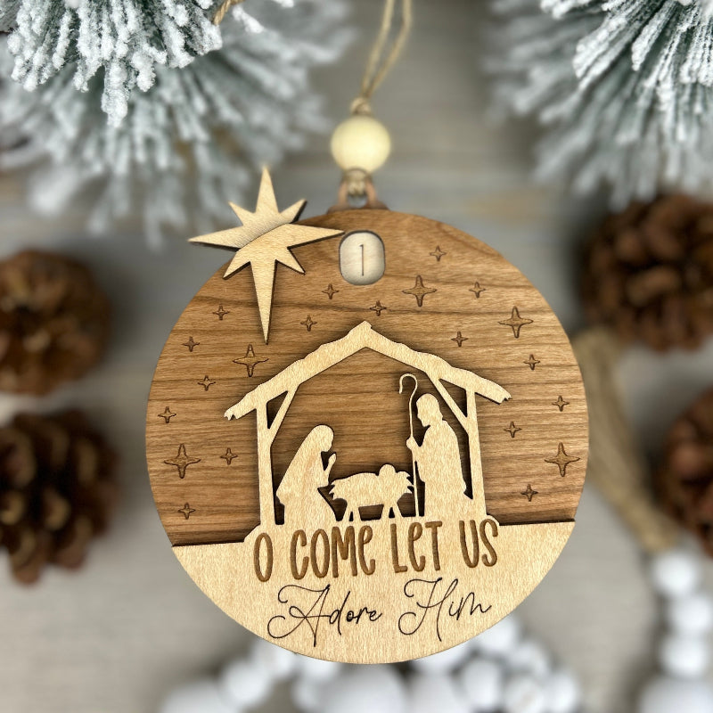 Countdown ornament with a Nativity scene.