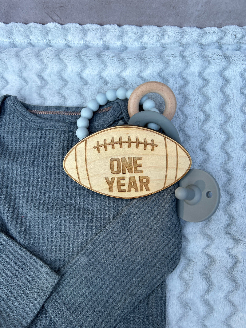 One year football monthly milestone.