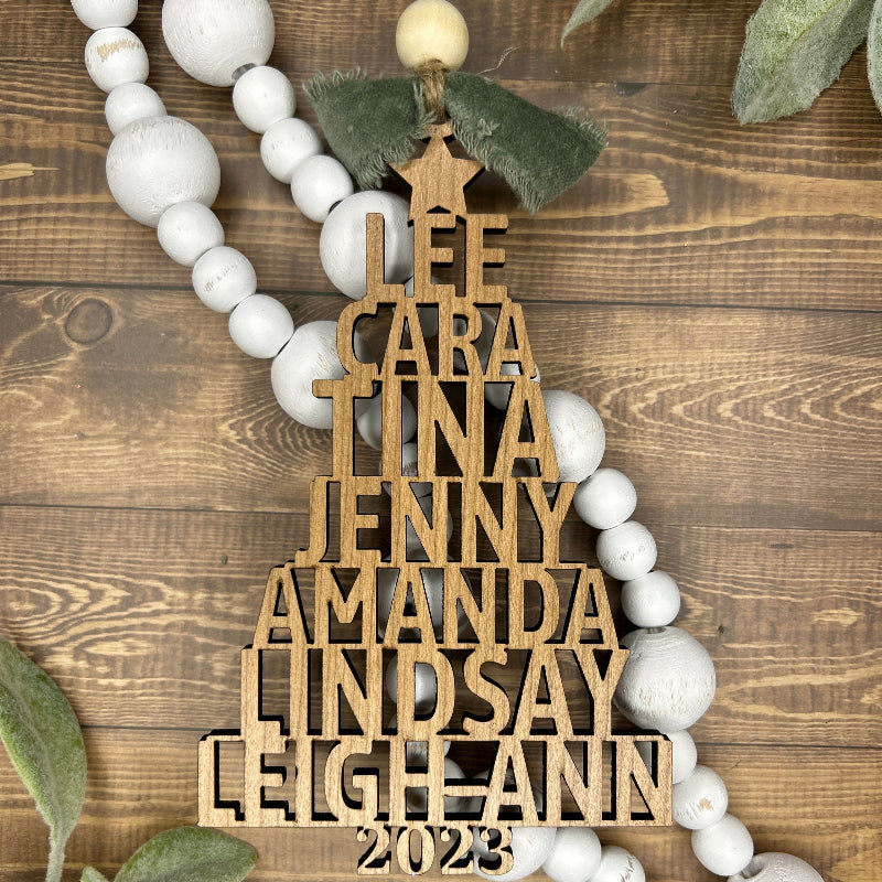 Beautiful ornament with family names in the shape of a Christmas tree.