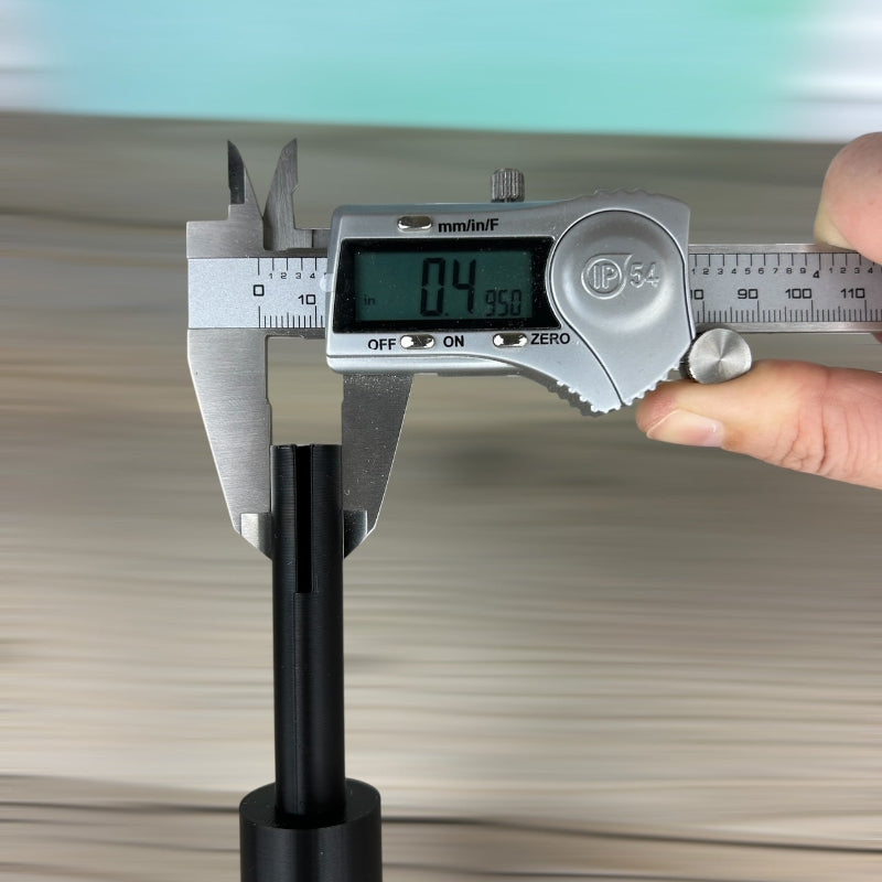 Calipers showing the size of the small wire curler being .495".