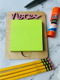 Sticky note holder for teachers desk