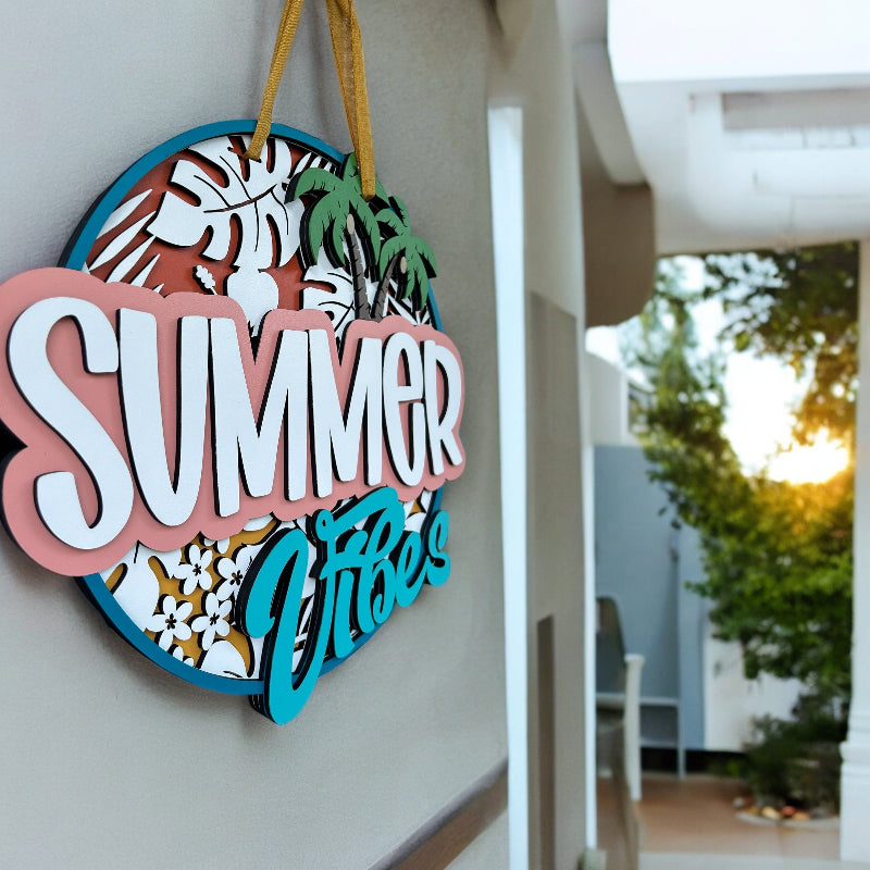 Summer vibes door sign hanging outside by a pool.