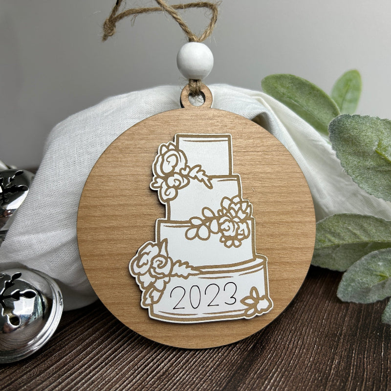 Just Married Cake ornament with the year the bride and groom had their wedding.
