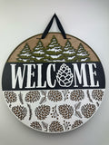 Welcome sign with Pinecones for a front door.