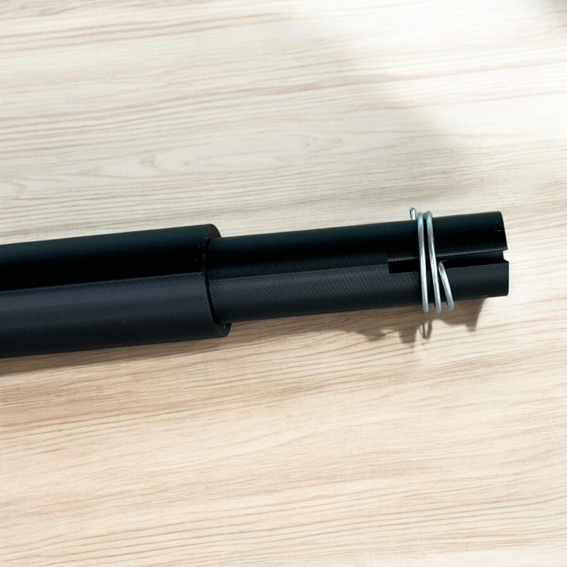 Curling wire wand with a sample wire wrapped around and showing the slot it goes in.