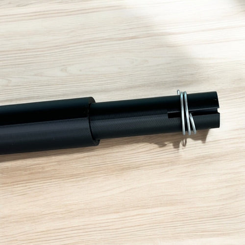 Curling wire wand with a sample wire wrapped around and showing the slot it goes in.